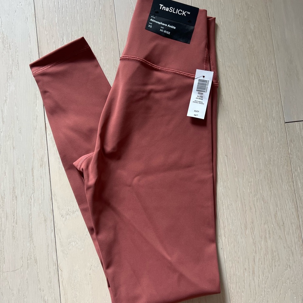 Aritzia TnAction TnaSLICK Atmosphere Hi-Rise Ankle Legging in Red Argil